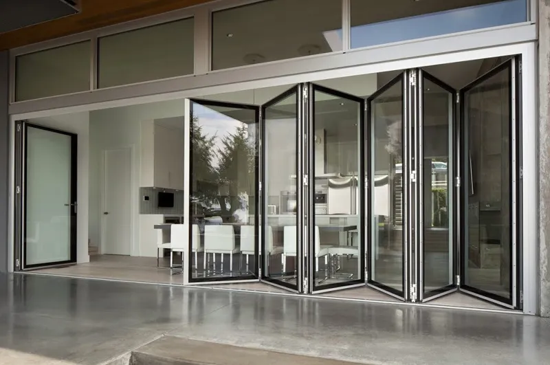 Aluminium bi-fold door system opening a full wall